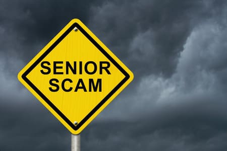 senior scam yield sign