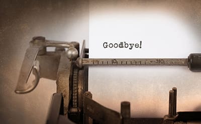 old fashioned typewriter with word Goodbye! on paper 